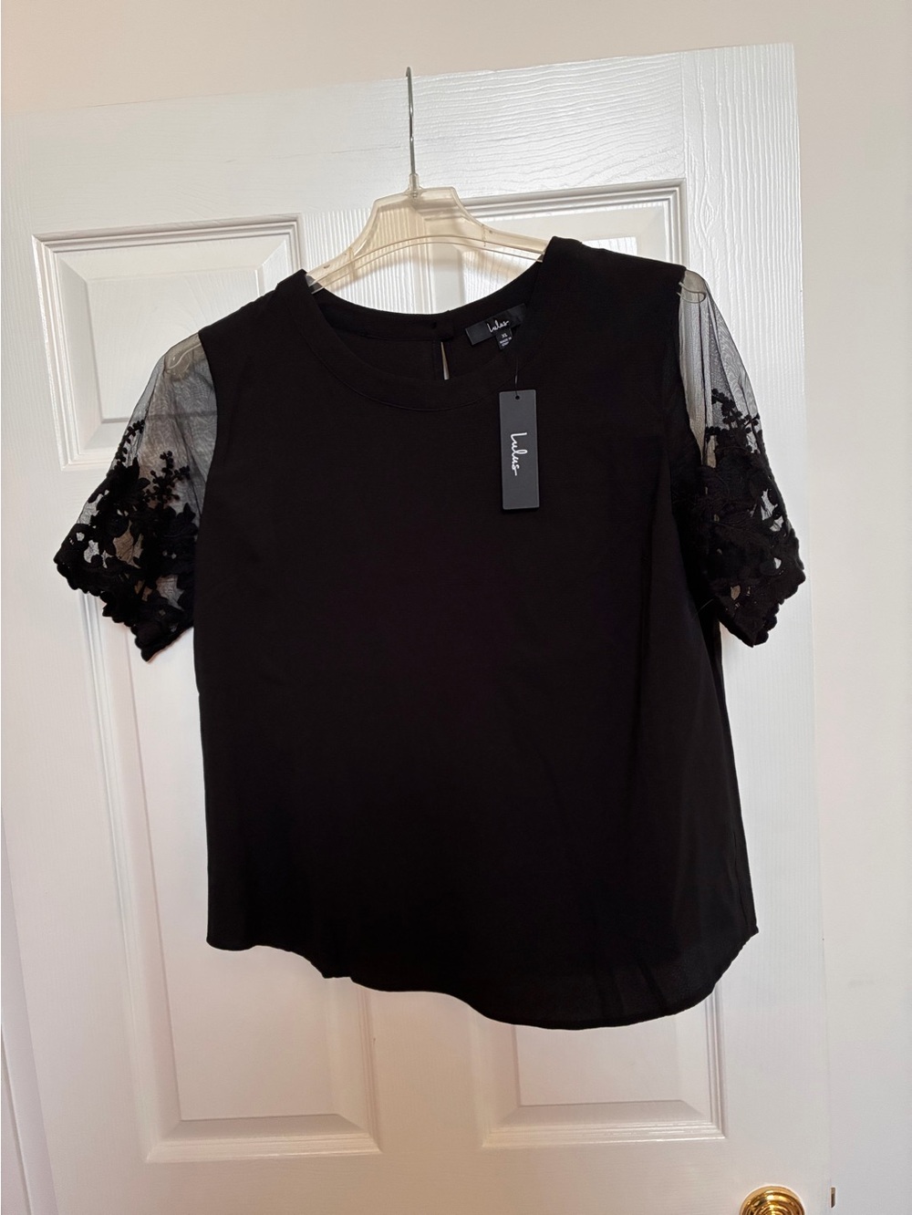 Lulu's Black Short-Sleeve Top with Lace Appliqué Mesh Sleeves